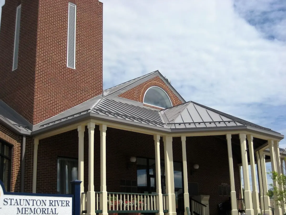 Skilled roofing craftsmen working on a residential roof in Ripon